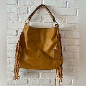 Faux leather yellowish tan fringe purse